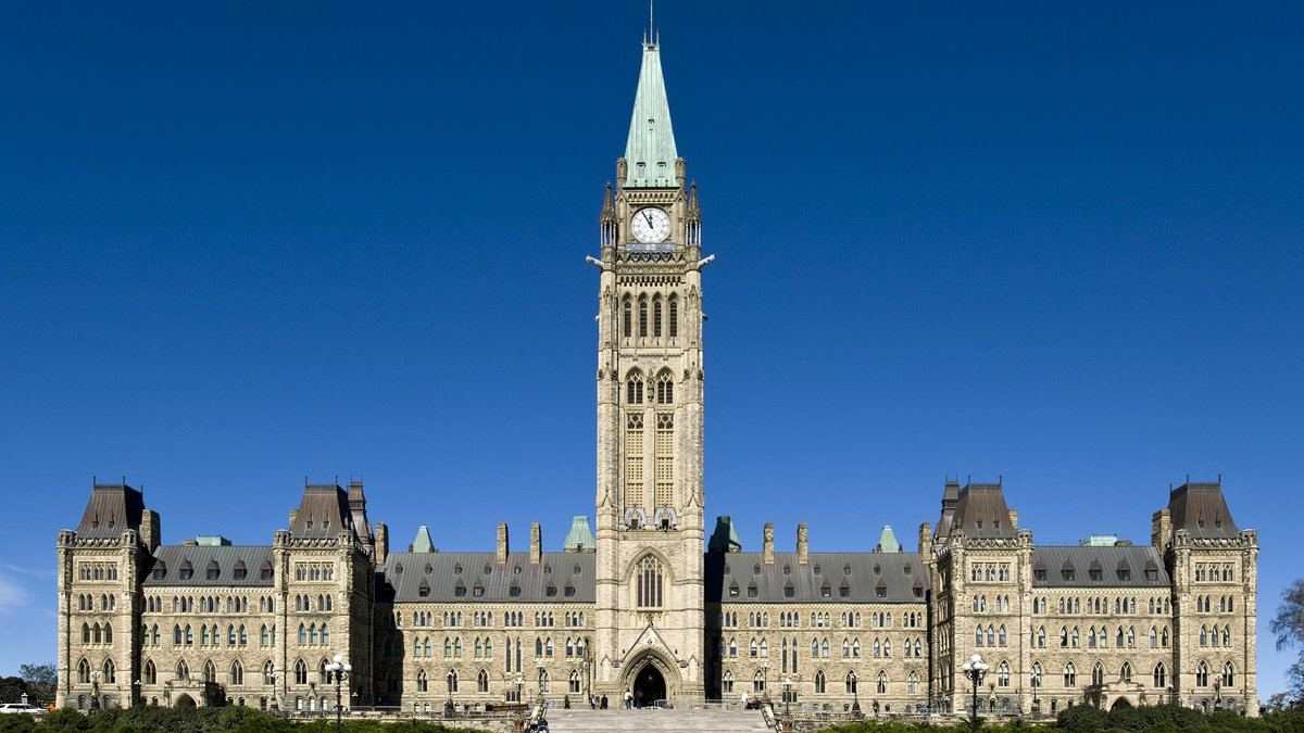 Centre Block and Peace Tower on Parliament Hill, Ottawa, as the Competition Bureau urges provinces to limit non-compete agreements