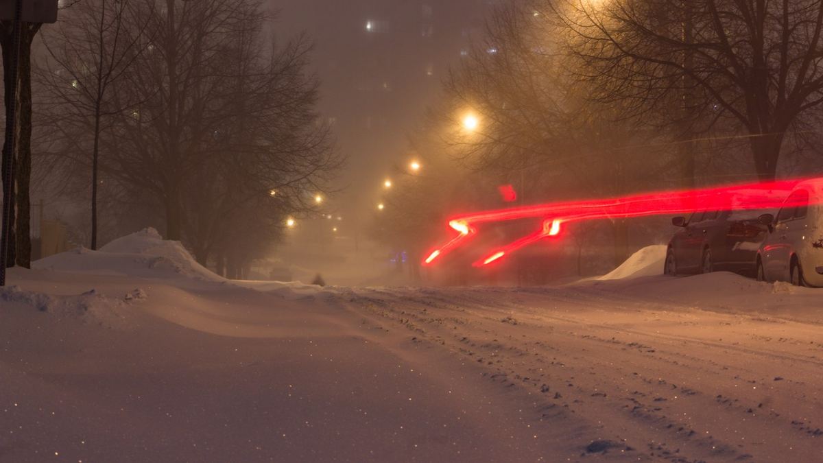 A residential street in Toronto buried in snow during a winter snowstorm