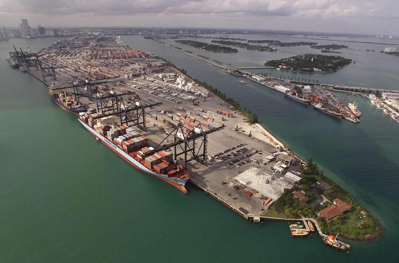 Aerial view of a container port — the lawsuit challenges U.S. tariffs on Canadian imports