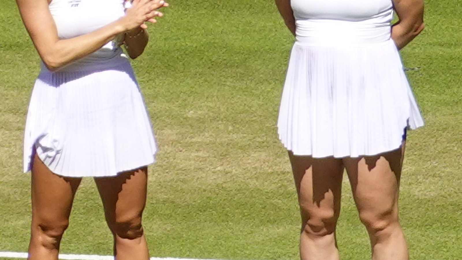 Gabriela Dabrowski and Luisa Stefani at the 2026 Wimbledon trophy ceremony