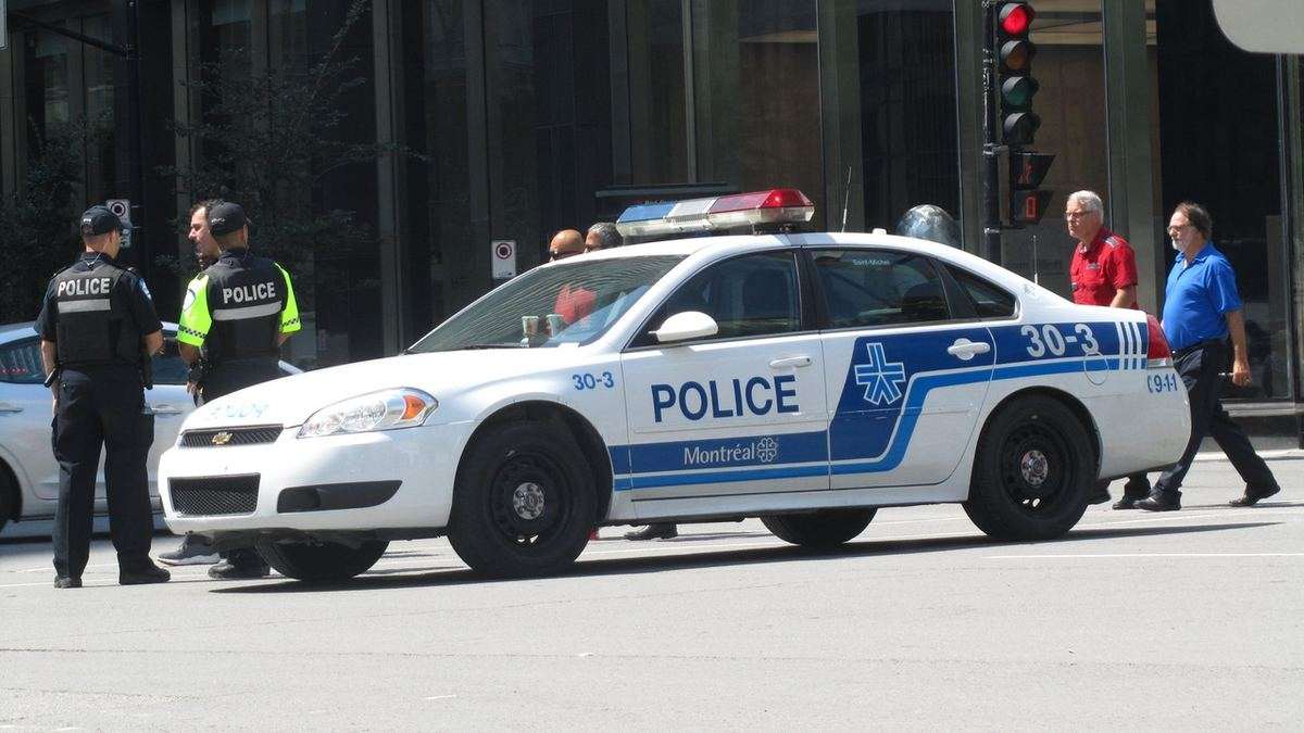 A Service de police de la Ville de Montreal (SPVM) patrol car in downtown Montreal